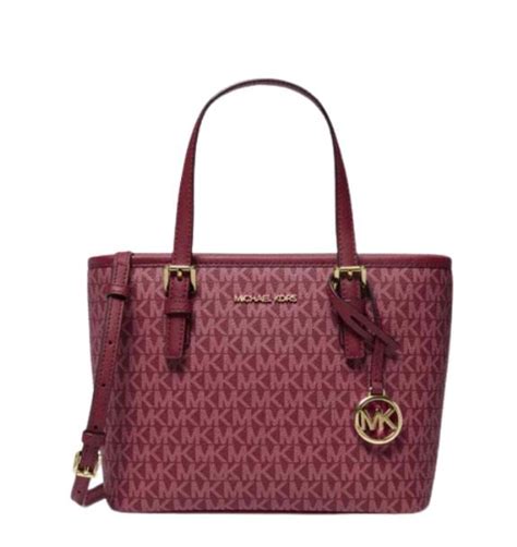 Michael Kors Jet set MD carryall tote Mulberry color 